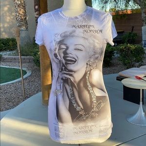 Marilyn Monroe t-shirt. T-shirt worth between $55-75, at some BOUTIQUES!!!!!